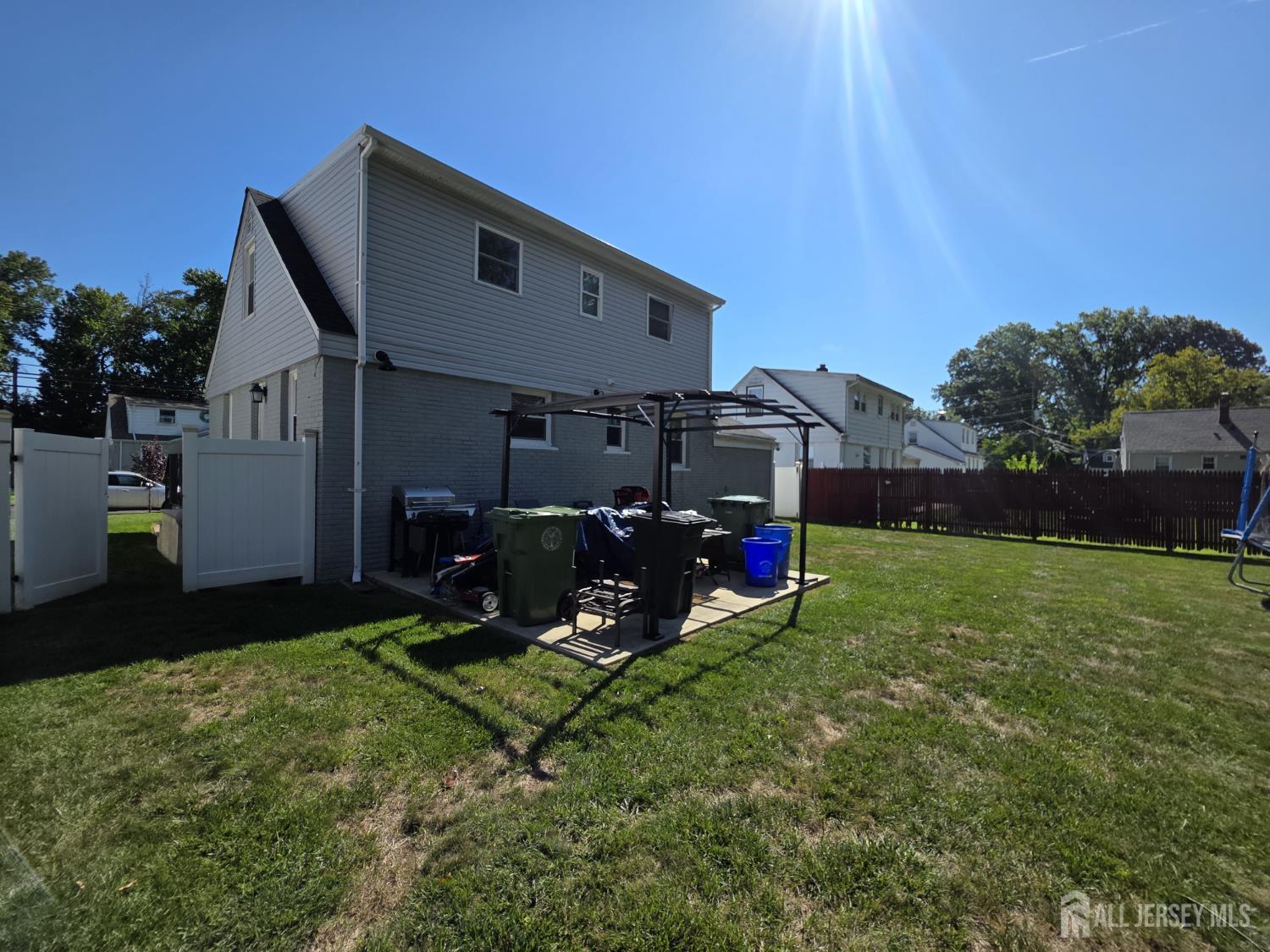 382 Douglas Road Roselle, NJ 07203 - Photo 17 of 17 a view of a house with backyard