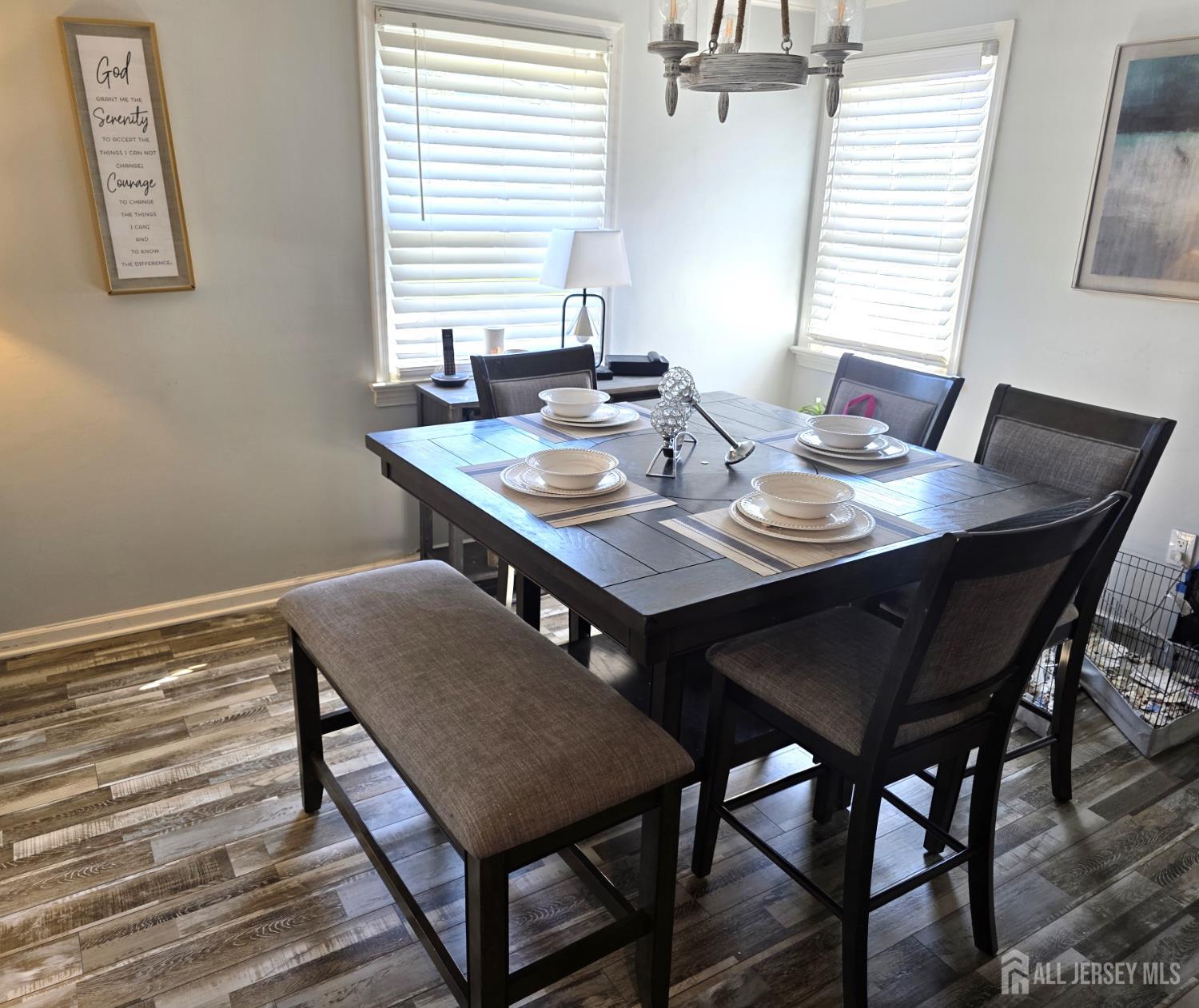 382 Douglas Road Roselle, NJ 07203 - Photo 5 of 17 a view of a dining room with a table and chairs