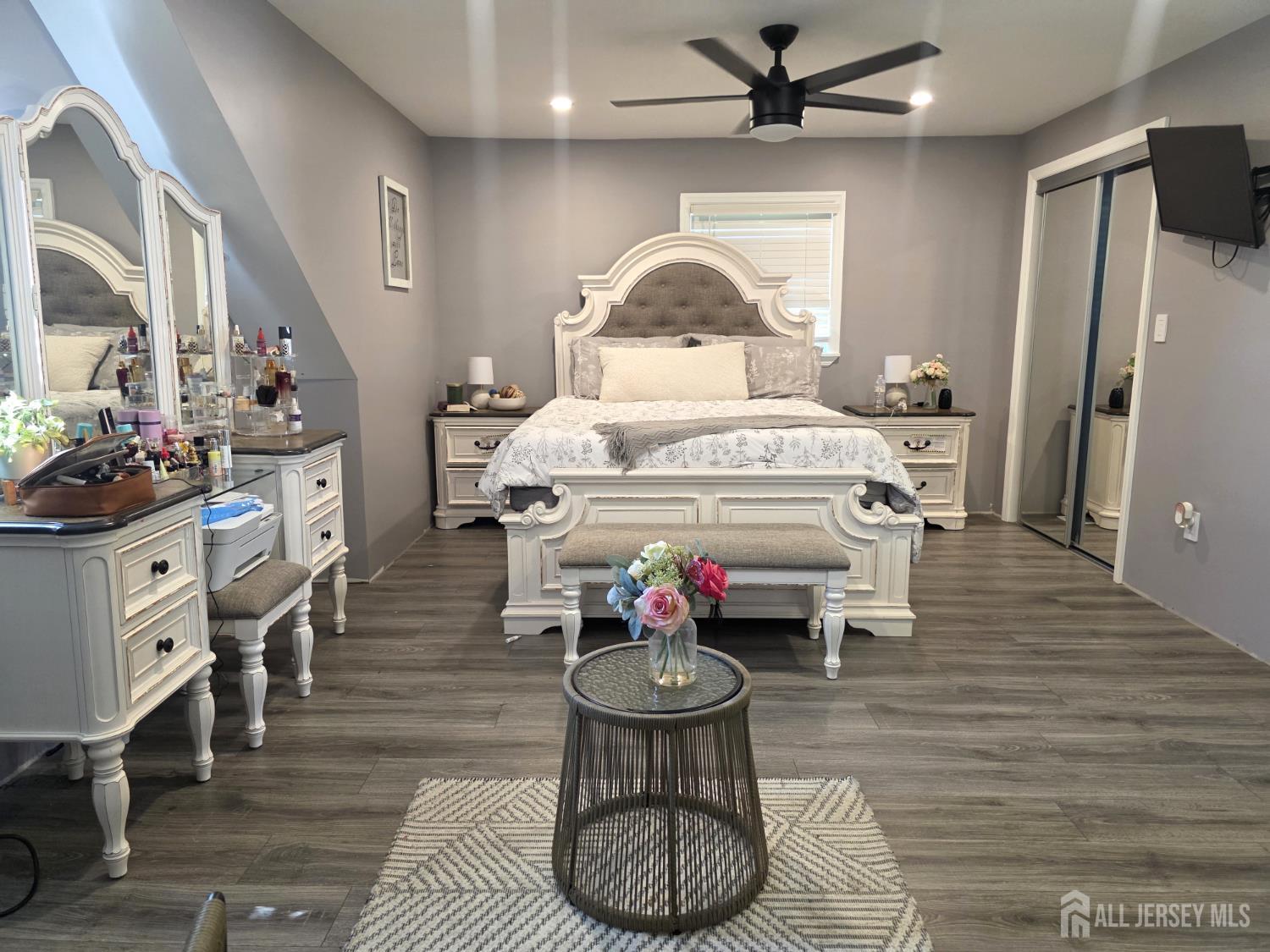 382 Douglas Road Roselle, NJ 07203 - Photo 9 of 17 a kitchen with a stove a chimney a table and chairs