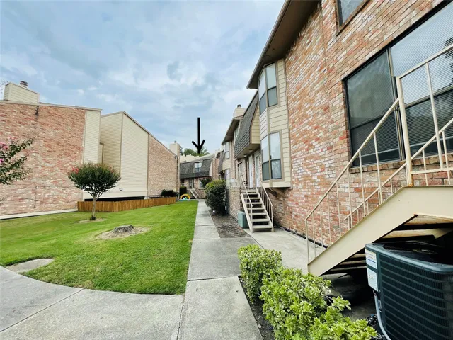 a view of a back yard of the house