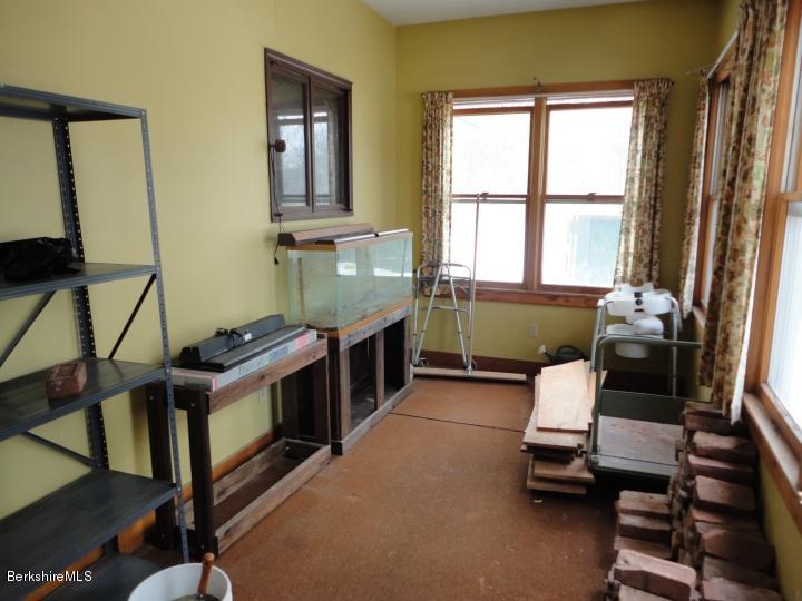 11 Albany Road West Stockbridge, MA 01266 - Photo 5 of 39 a living room with furniture a flat screen tv and a window