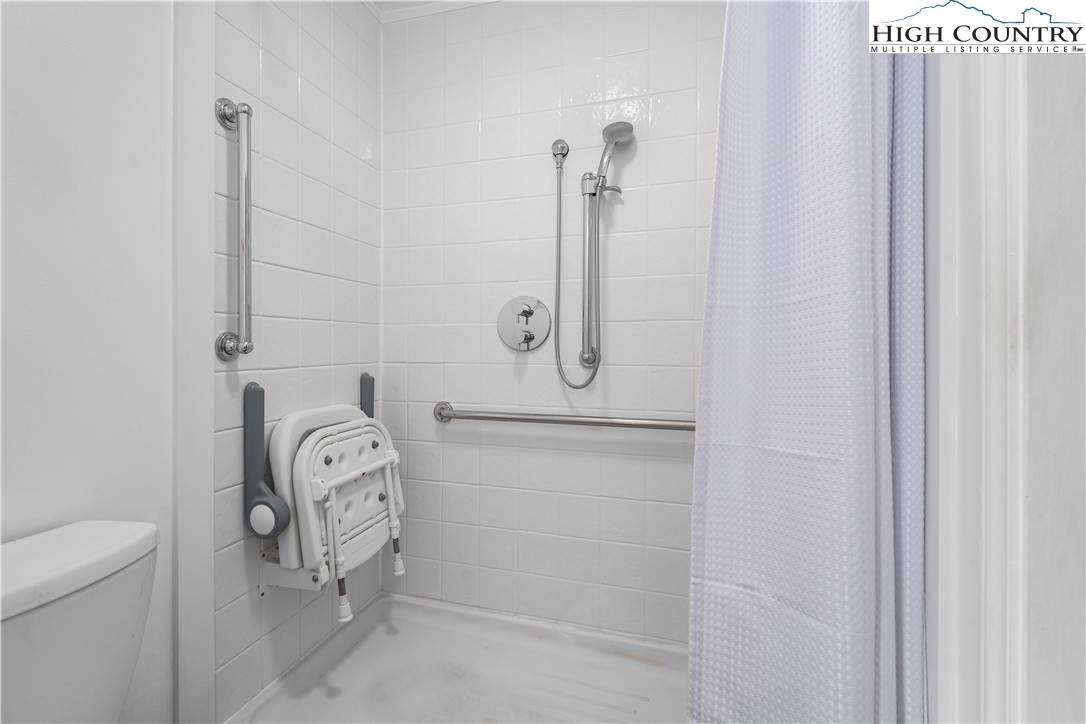 1546 Stage Road Mountain City, TN 37683 - Photo 24 of 48 a bathroom with a shower