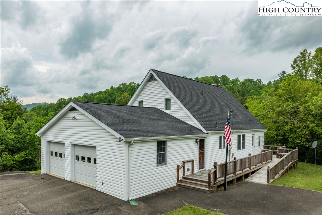 1546 Stage Road Mountain City, TN 37683 - Photo 3 of 48 a view of house with a yard