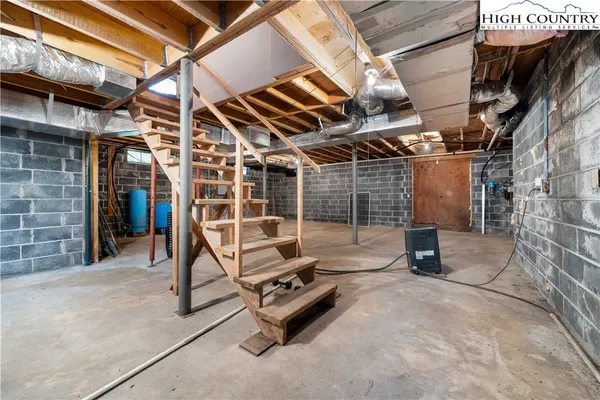 a view of empty room with staircase