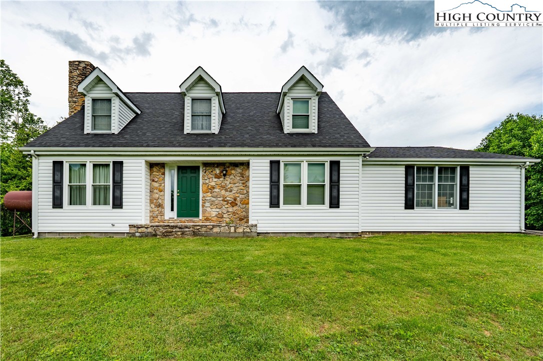 1546 Stage Road Mountain City, TN 37683 - Photo 43 of 48 a front view of a house with a garden