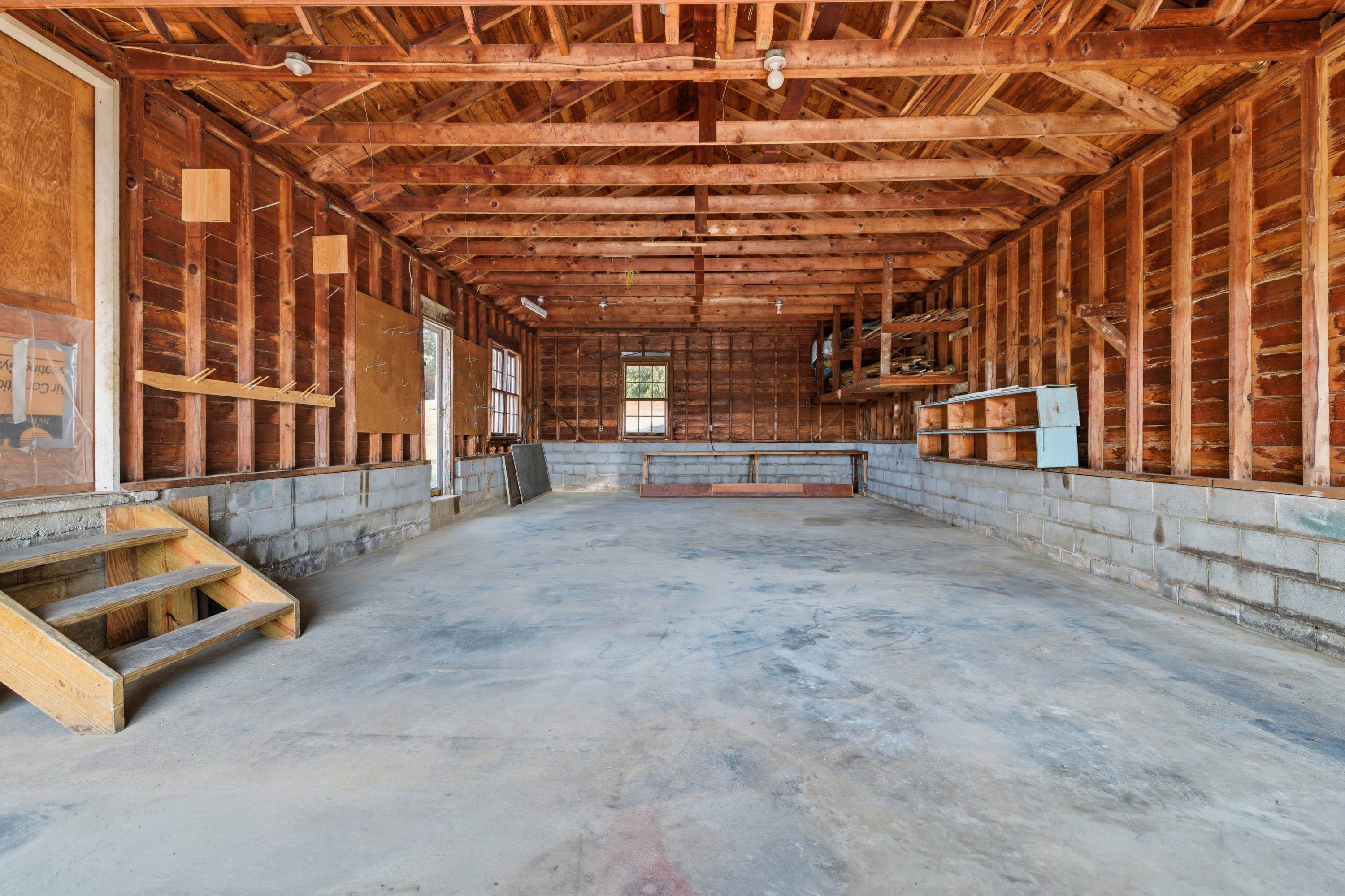 3138 Cross Keys Road Harrisonburg, VA 22801 - Photo 51 of 74 The garage fits 2 cars with additional storage above. This garage is very large and offers space for both vehicles and storage!