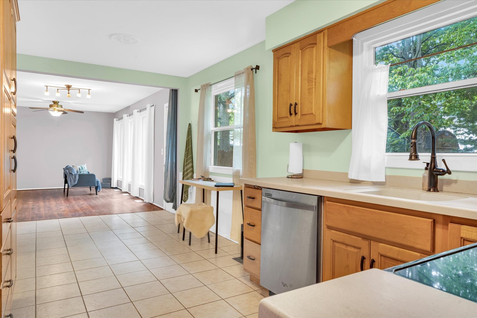 58 Woodhill Court Decatur, IL 62521 - Photo 12 of 29 a kitchen with a sink cabinets and wooden floor
