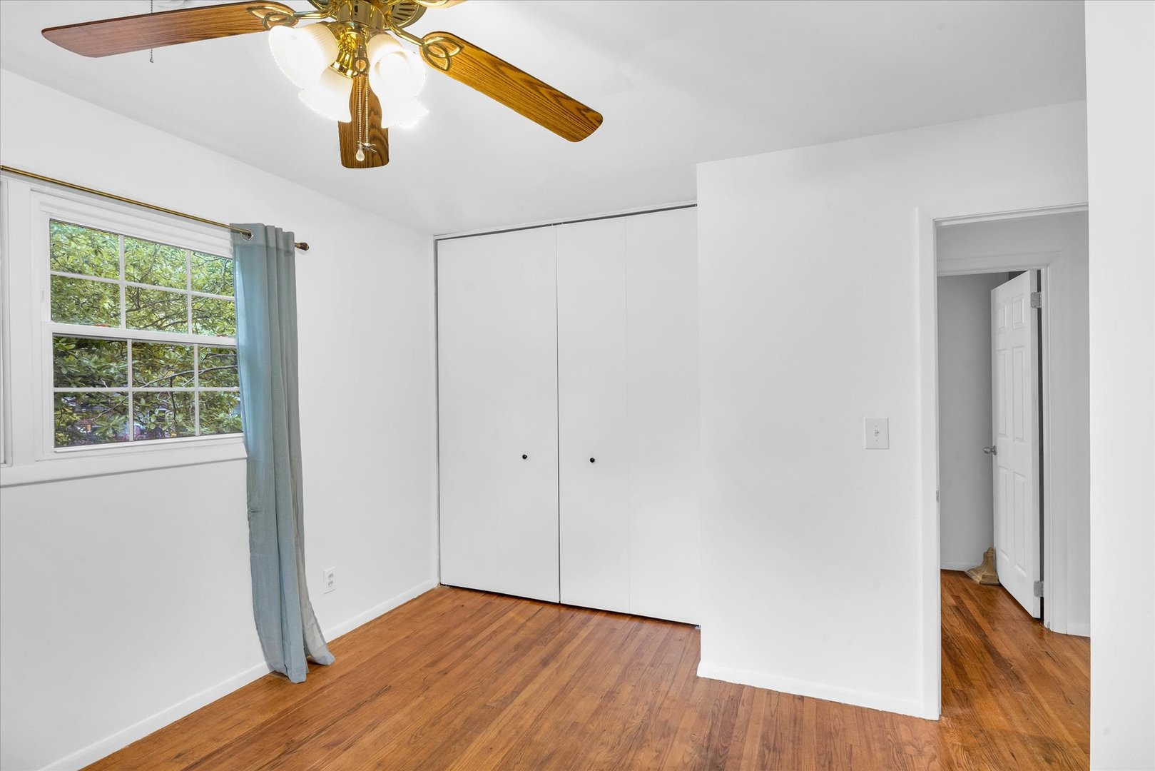 58 Woodhill Court Decatur, IL 62521 - Photo 19 of 29 a view of a hallway with wooden floor and chandelier