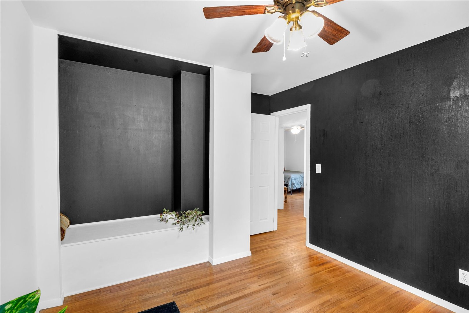 58 Woodhill Court Decatur, IL 62521 - Photo 21 of 29 wooden floor in an empty room with a window