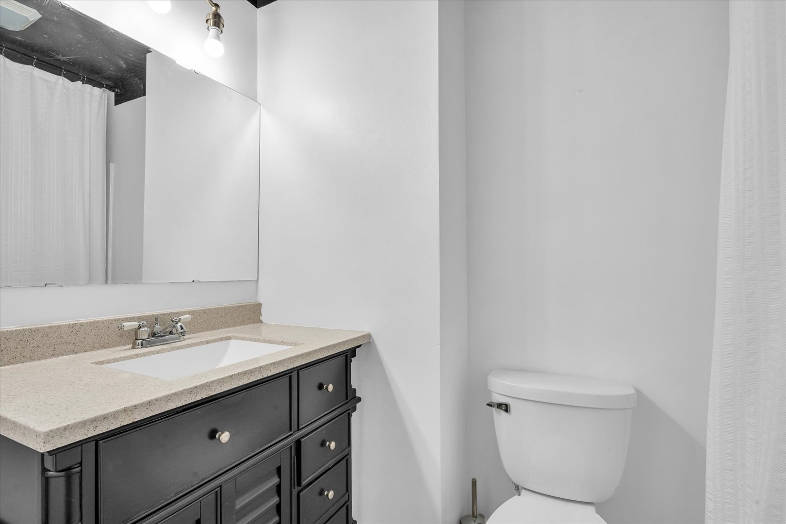 58 Woodhill Court Decatur, IL 62521 - Photo 22 of 29 a bathroom with a sink toilet and mirror