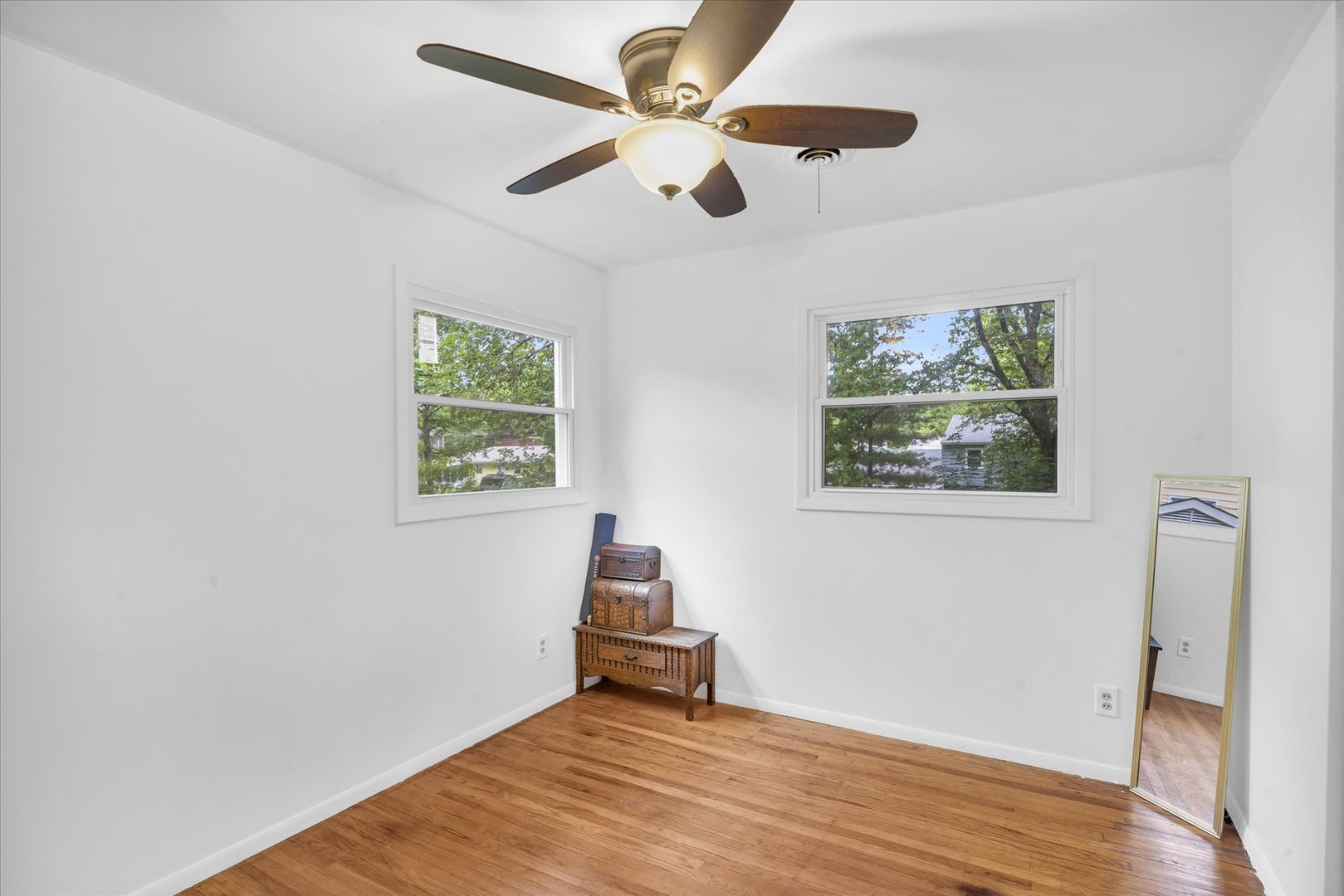 58 Woodhill Court Decatur, IL 62521 - Photo 23 of 29 wooden floor in an empty room with a window