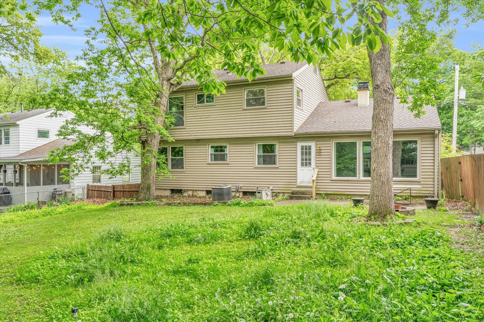 58 Woodhill Court Decatur, IL 62521 - Photo 25 of 29 a front view of a house with a yard