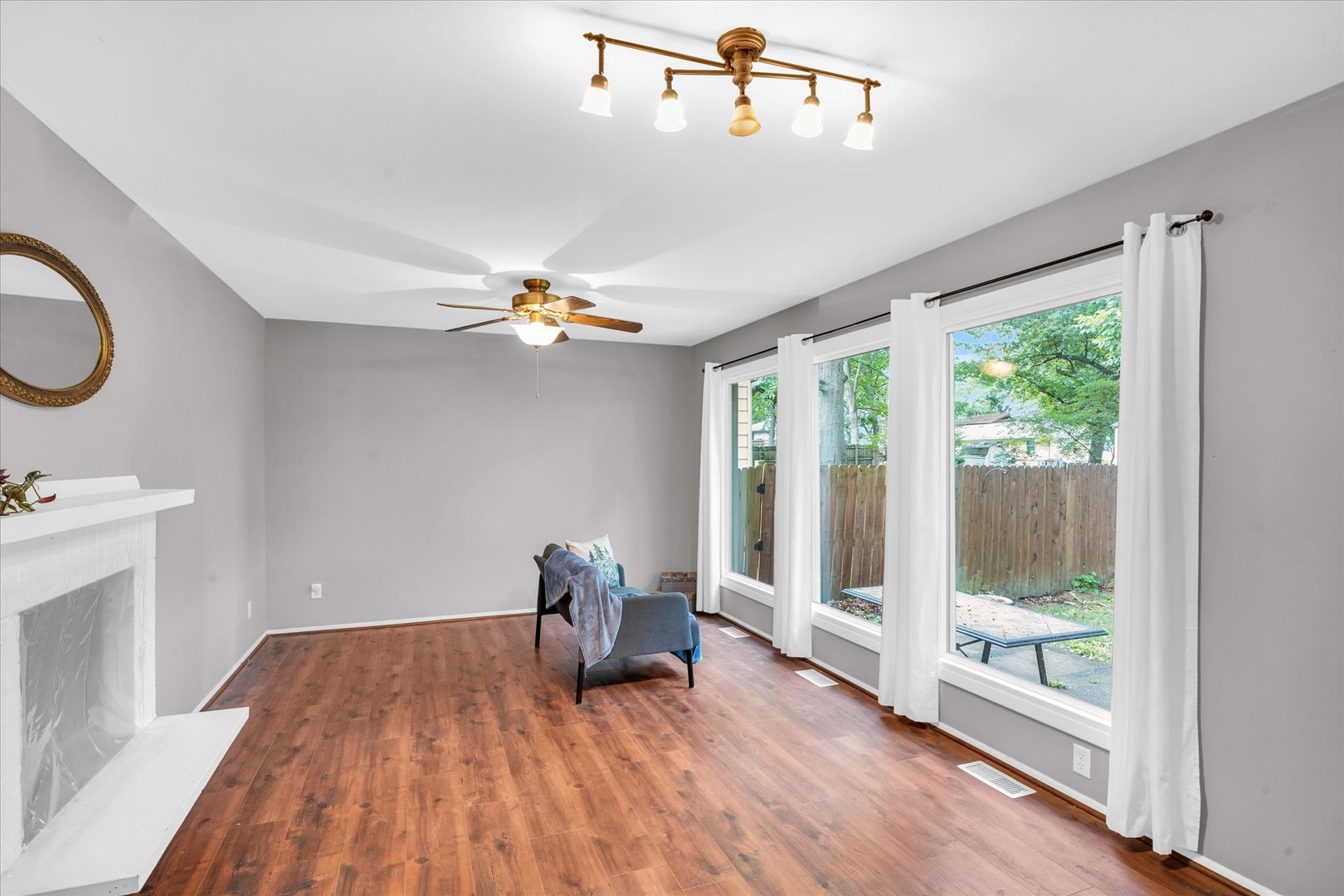 58 Woodhill Court Decatur, IL 62521 - Photo 5 of 29 a view of a room with wooden floor fan and windows