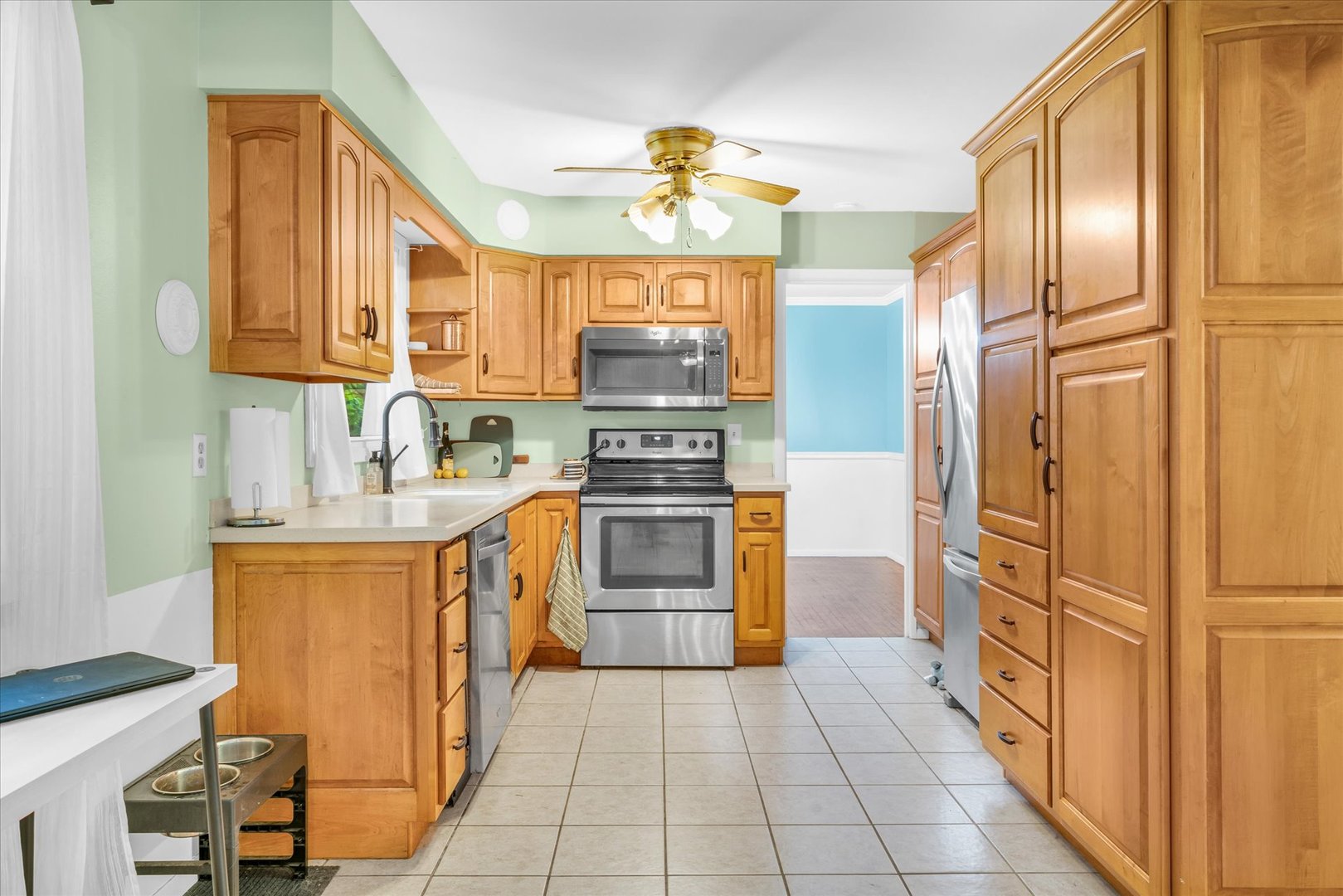 58 Woodhill Court Decatur, IL 62521 - Photo 8 of 29 a kitchen with stainless steel appliances granite countertop a refrigerator and a sink