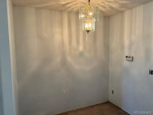 a view of a chandelier in a room