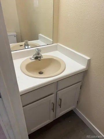 a bathroom with a sink and a toilet