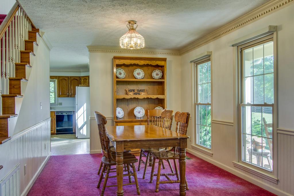 2352 Tom Fitzgerald Road Columbia, TN 38401 - Photo 11 of 30 a view of a dining room with furniture and wooden floor