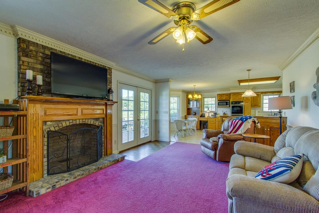 2352 Tom Fitzgerald Road Columbia, TN 38401 - Photo 12 of 30 a living room with furniture and a fireplace