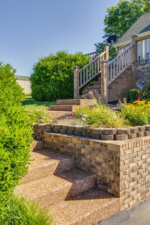 2352 Tom Fitzgerald Road Columbia, TN 38401 - Photo 30 of 30 a view of a yard with flower plants