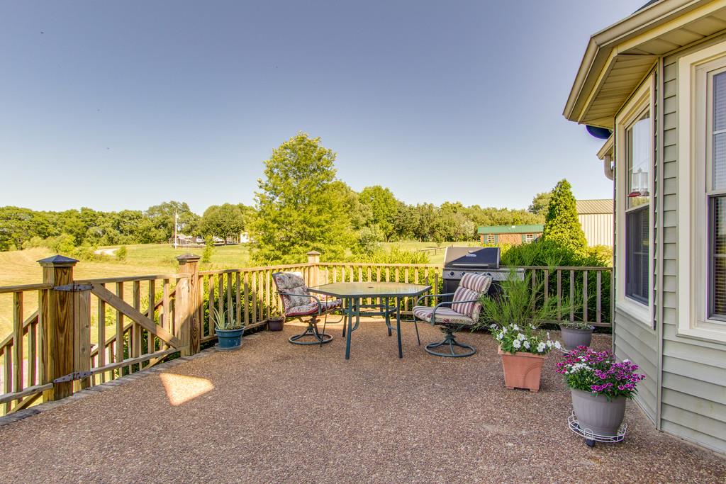 2352 Tom Fitzgerald Road Columbia, TN 38401 - Photo 4 of 30 a view of a chairs and table on the terrace