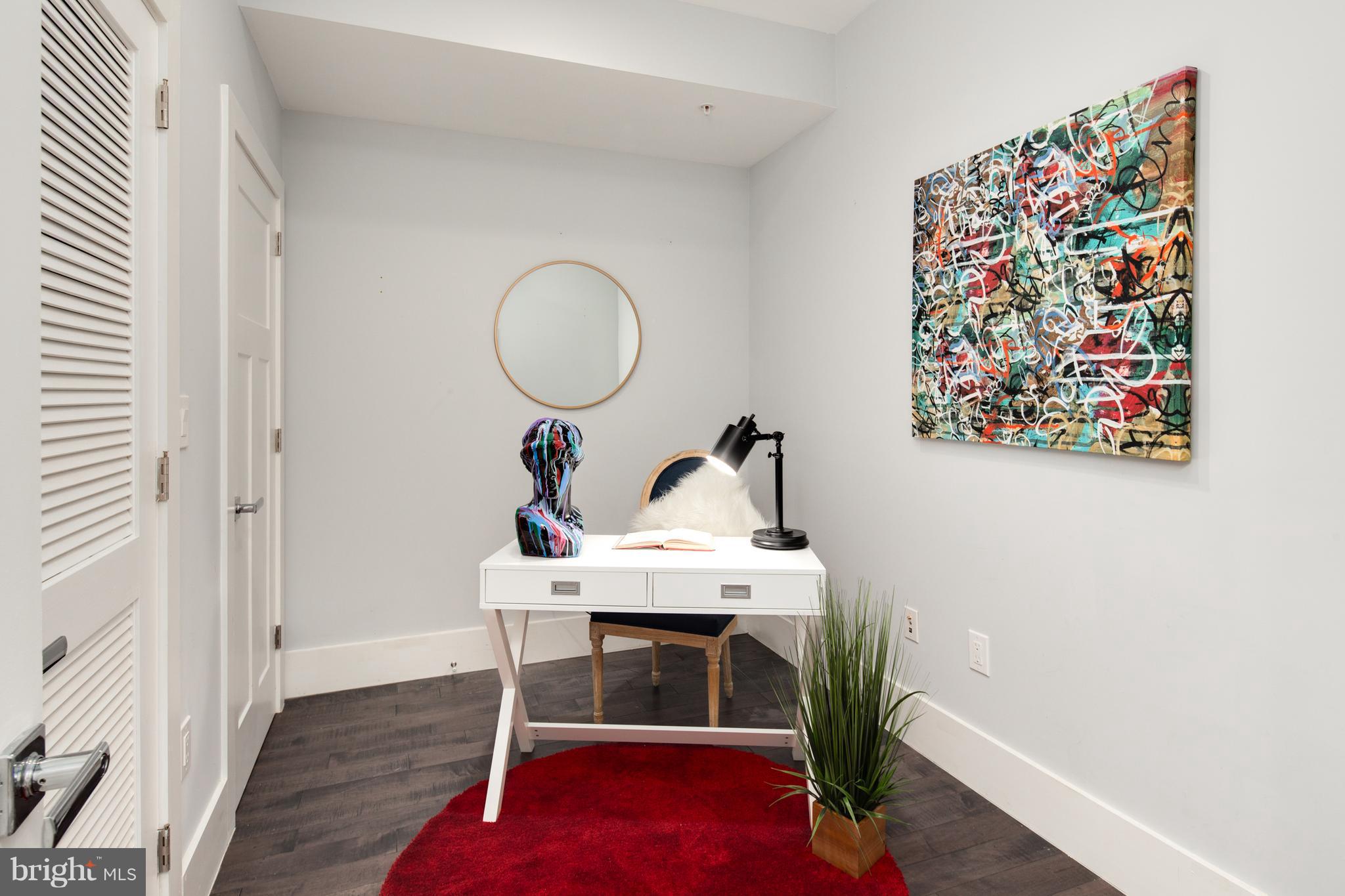 1230 Fairmont Street Northwest, Unit 2 Washington, DC 20009 - Photo 19 of 21 a workspace with furniture and wooden floor