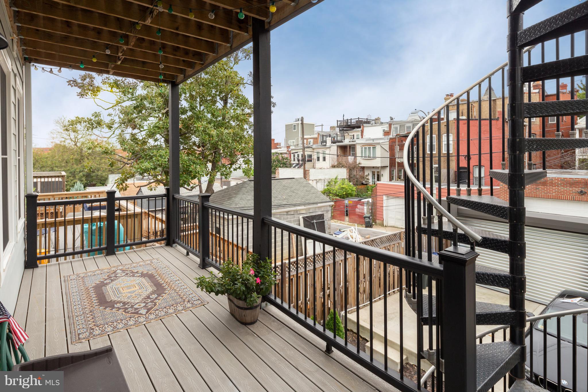 1230 Fairmont Street Northwest, Unit 2 Washington, DC 20009 - Photo 20 of 21 a view of a balcony with furniture