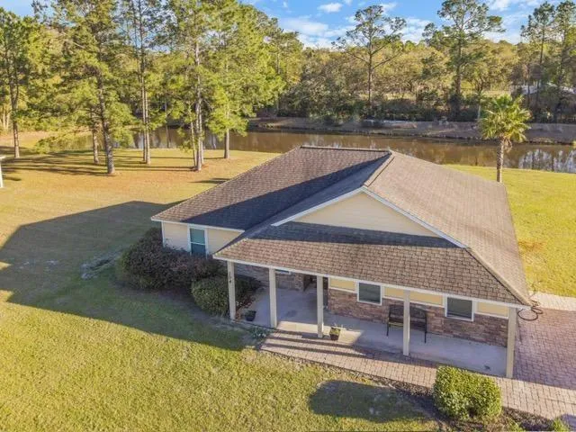 a view of a swimming pool with an outdoor space