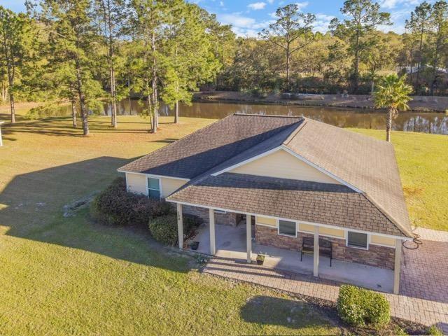 a view of a swimming pool with an outdoor space
