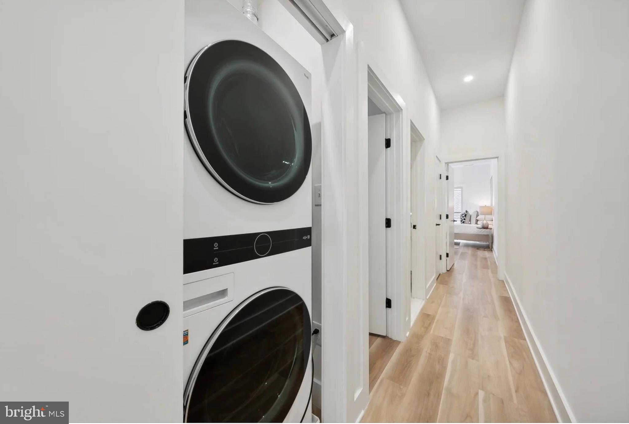 2015 13th Street Northwest, Unit 2 Washington, DC 20009 - Photo 15 of 40 a view of a hallway with washer and dryer