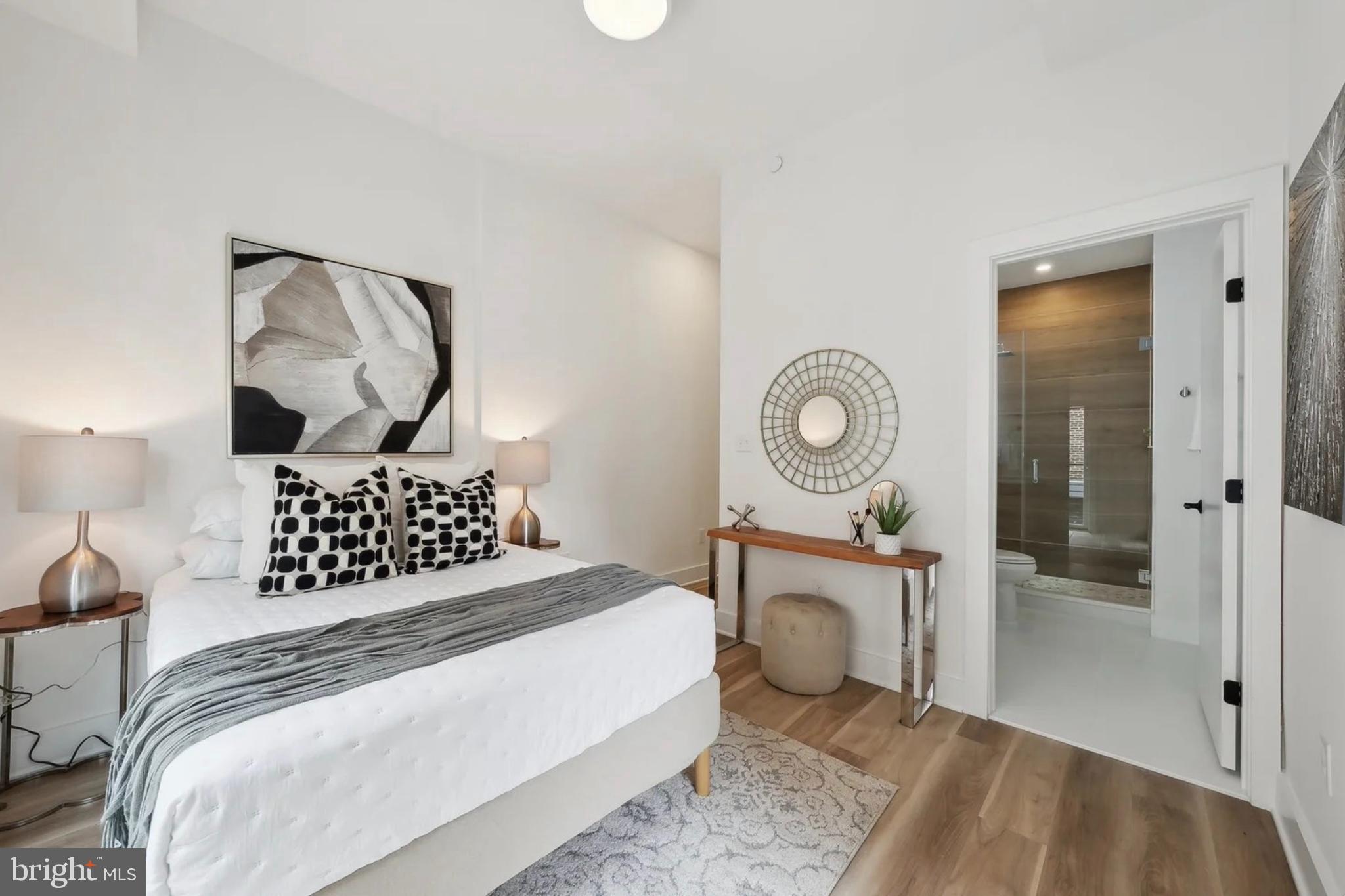 2015 13th Street Northwest, Unit 2 Washington, DC 20009 - Photo 23 of 40 a bedroom with a bed and a dresser