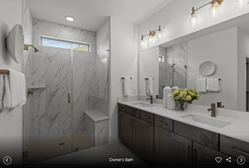 130 Kimberwick Court Georgetown, TX 78633 - Photo 9 of 13 a bathroom with double vanity and a mirror