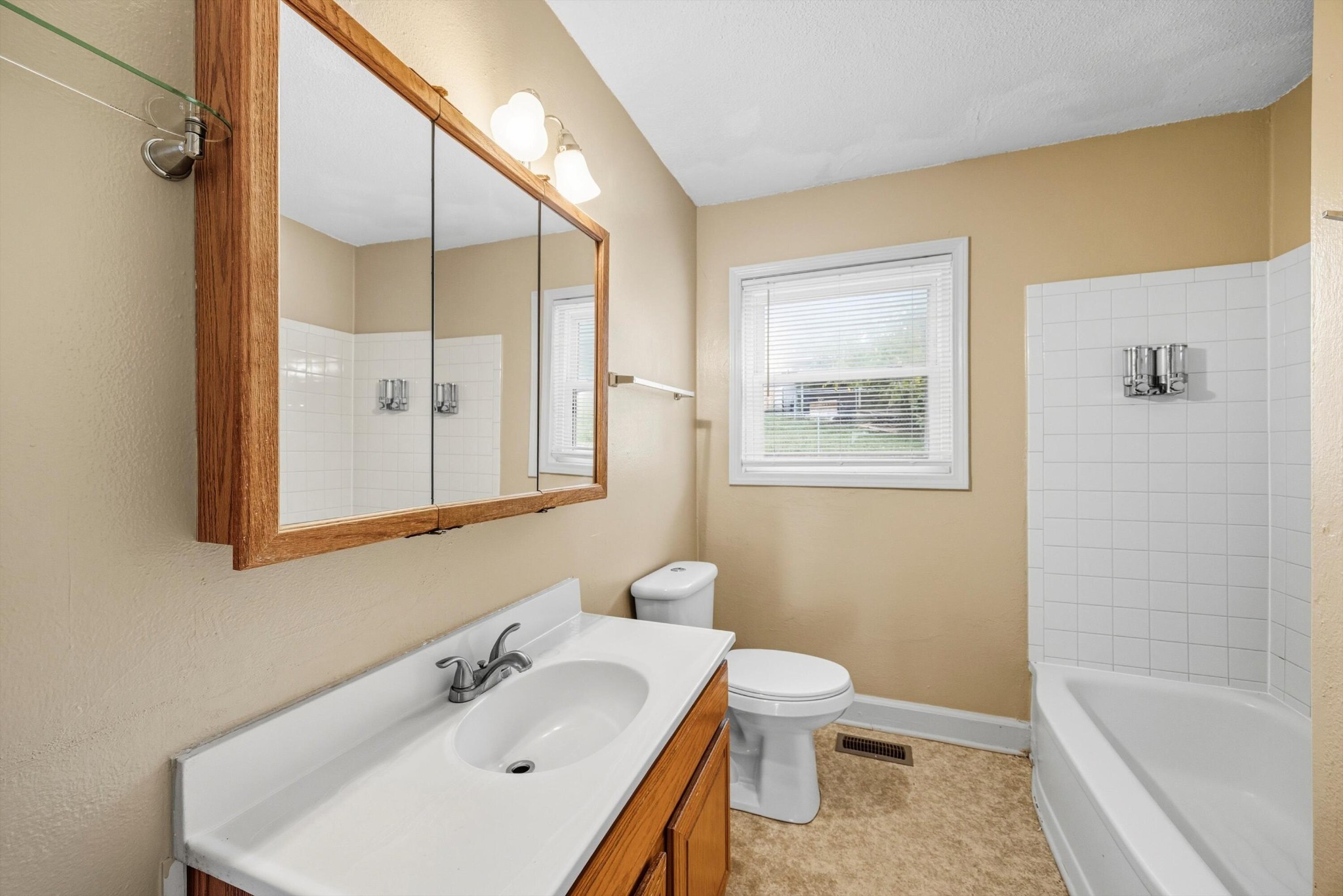 520 Bacon Trail Chattanooga, TN 37412 - Photo 16 of 23 a bathroom with a sink a toilet and shower
