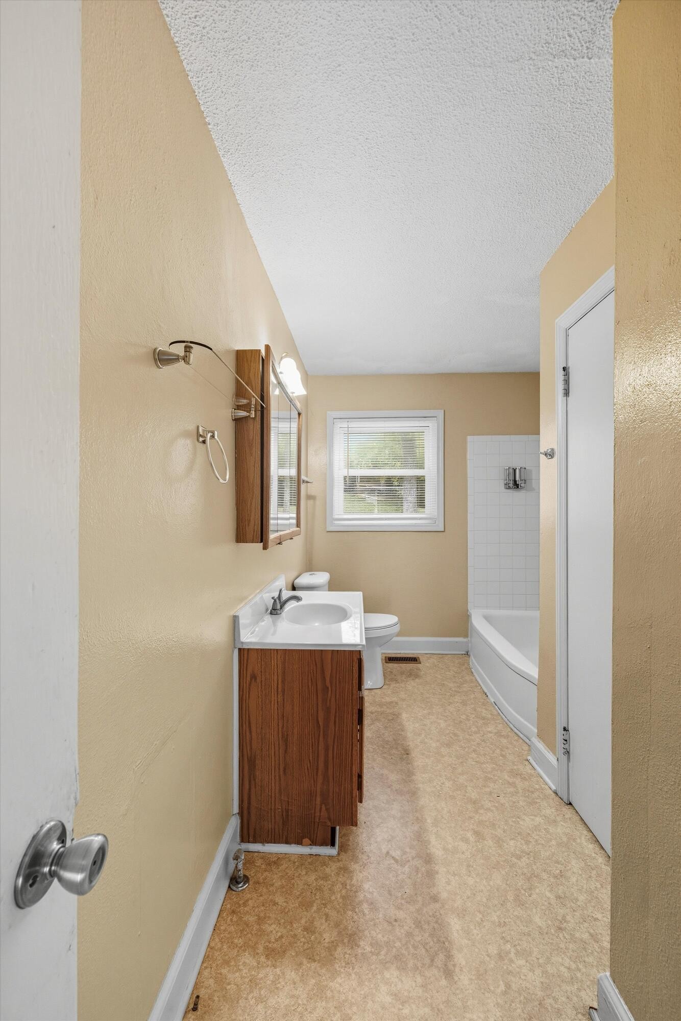 520 Bacon Trail Chattanooga, TN 37412 - Photo 17 of 23 a bathroom with a sink a toilet and mirror