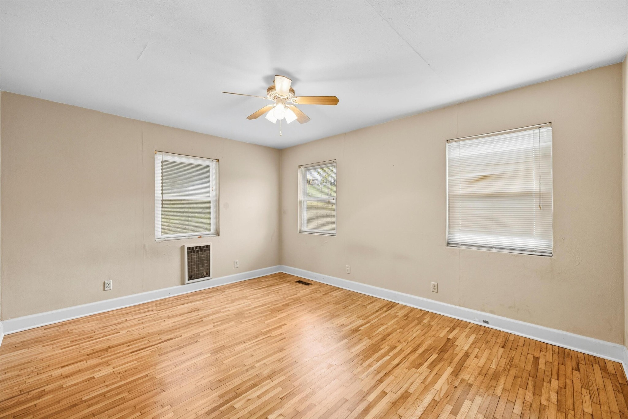 520 Bacon Trail Chattanooga, TN 37412 - Photo 18 of 23 a view of empty room with wooden floor and fan