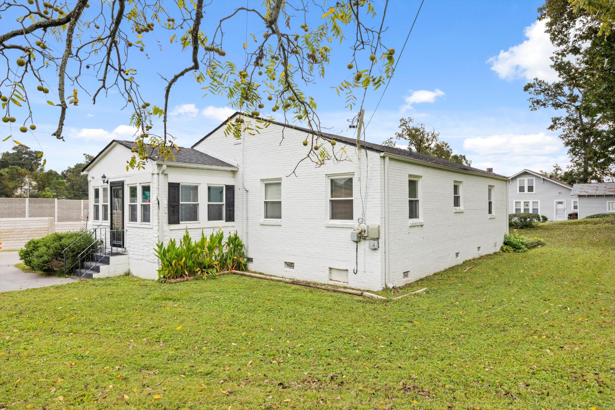 520 Bacon Trail Chattanooga, TN 37412 - Photo 21 of 23 a view of white house with a yard and potted plants