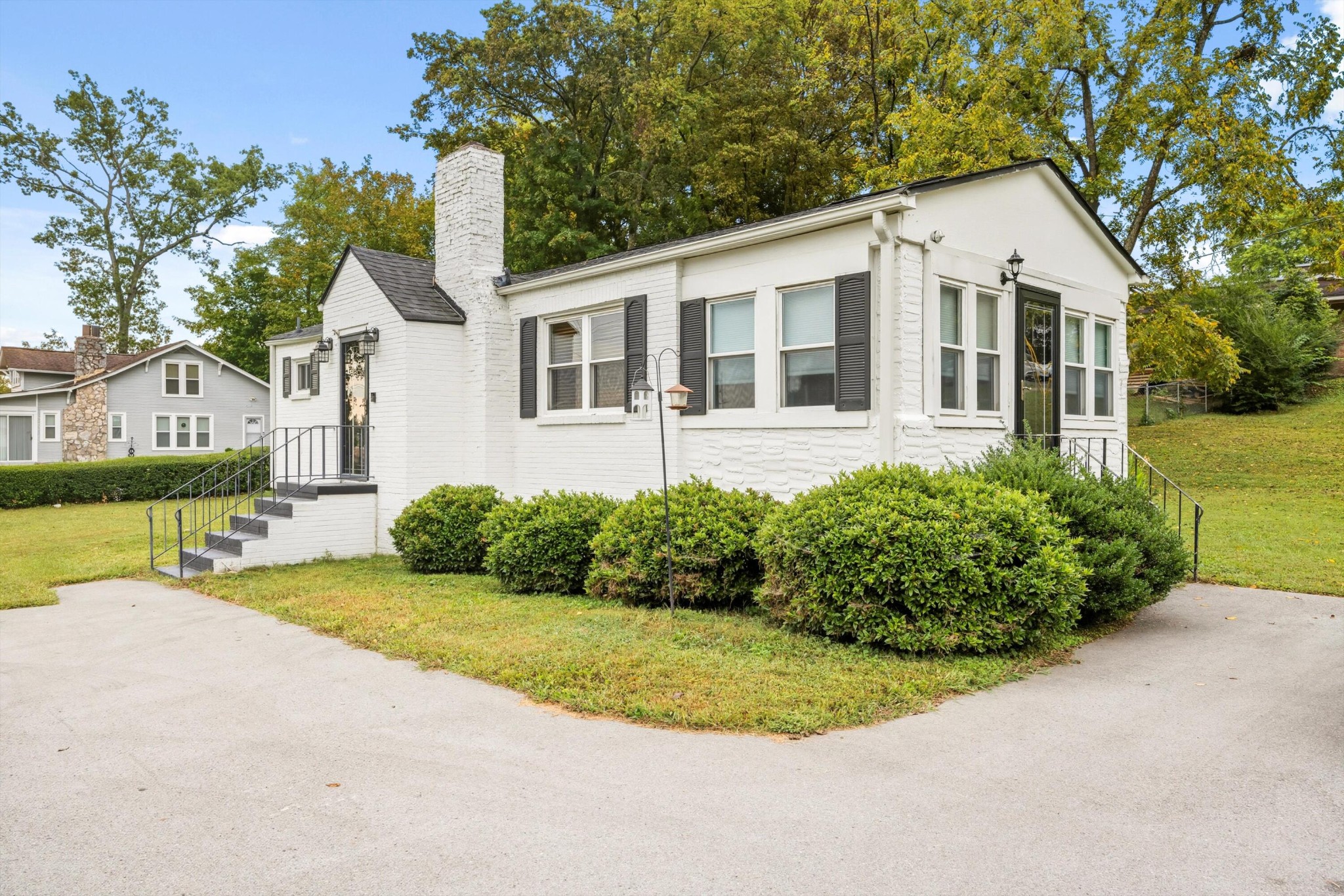 520 Bacon Trail Chattanooga, TN 37412 - Photo 3 of 23 a front view of a house with a garden and plants