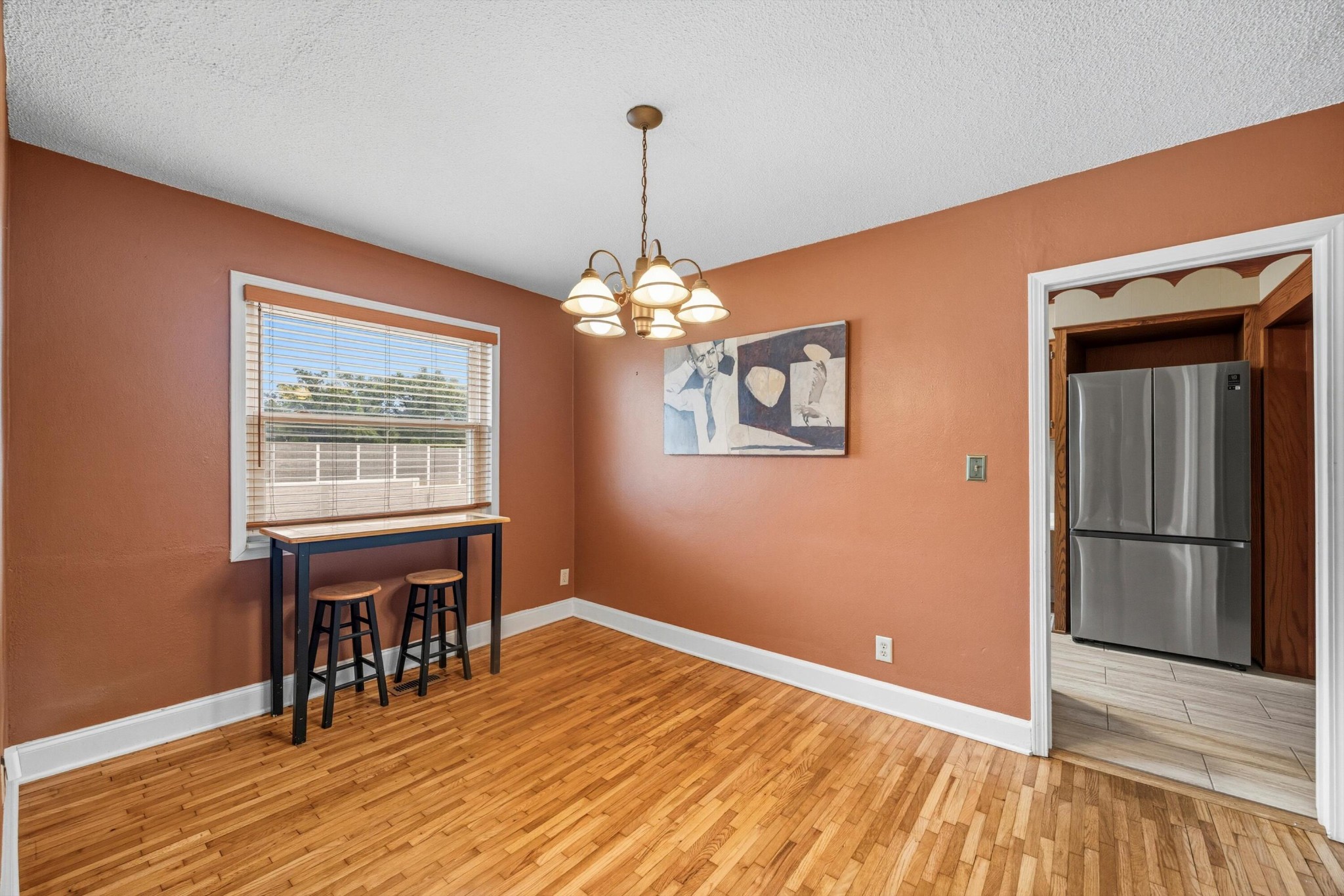 520 Bacon Trail Chattanooga, TN 37412 - Photo 8 of 23 a room with wooden floor table and chairs