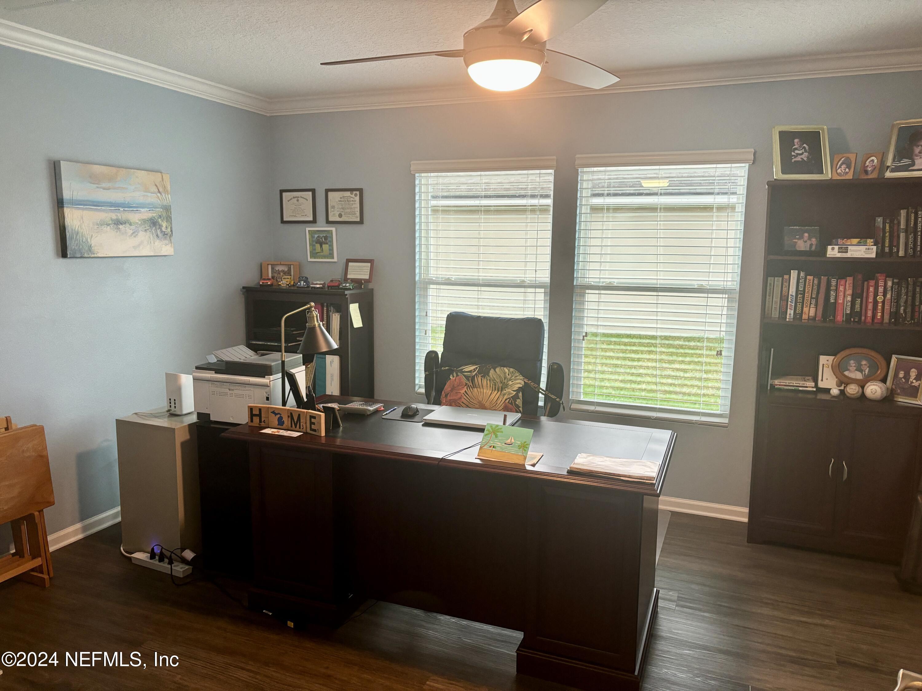 277 Palace Drive St. Augustine, FL 32084 - Photo 15 of 36 a view of a workspace with furniture and a window