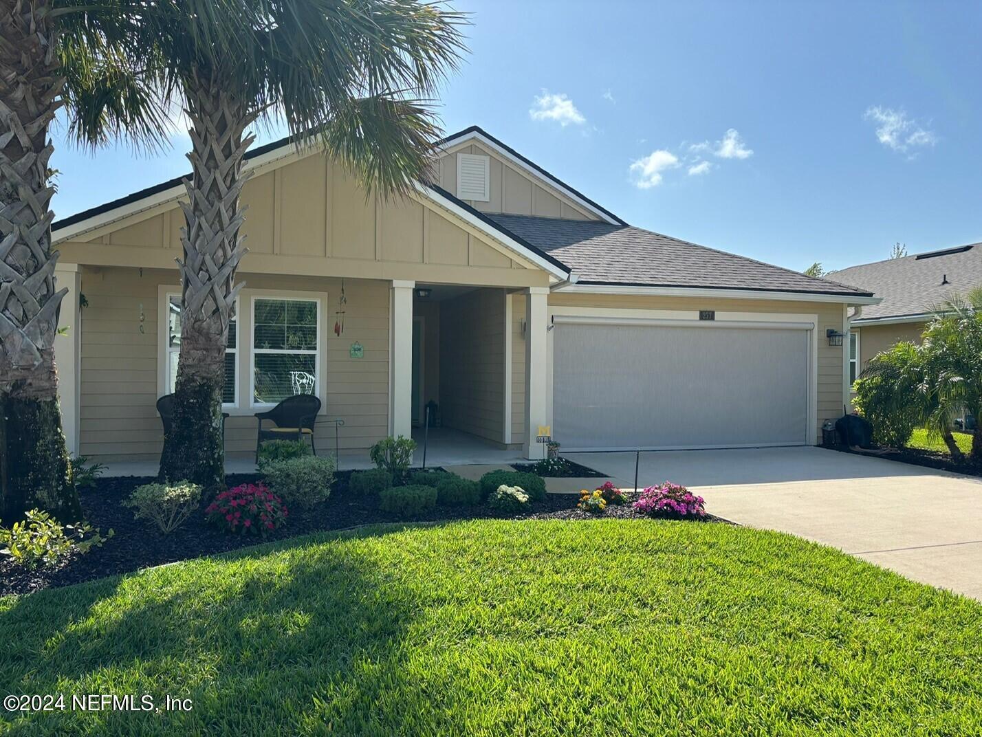 277 Palace Drive St. Augustine, FL 32084 - Photo 2 of 36 a front view of house with yard and green space
