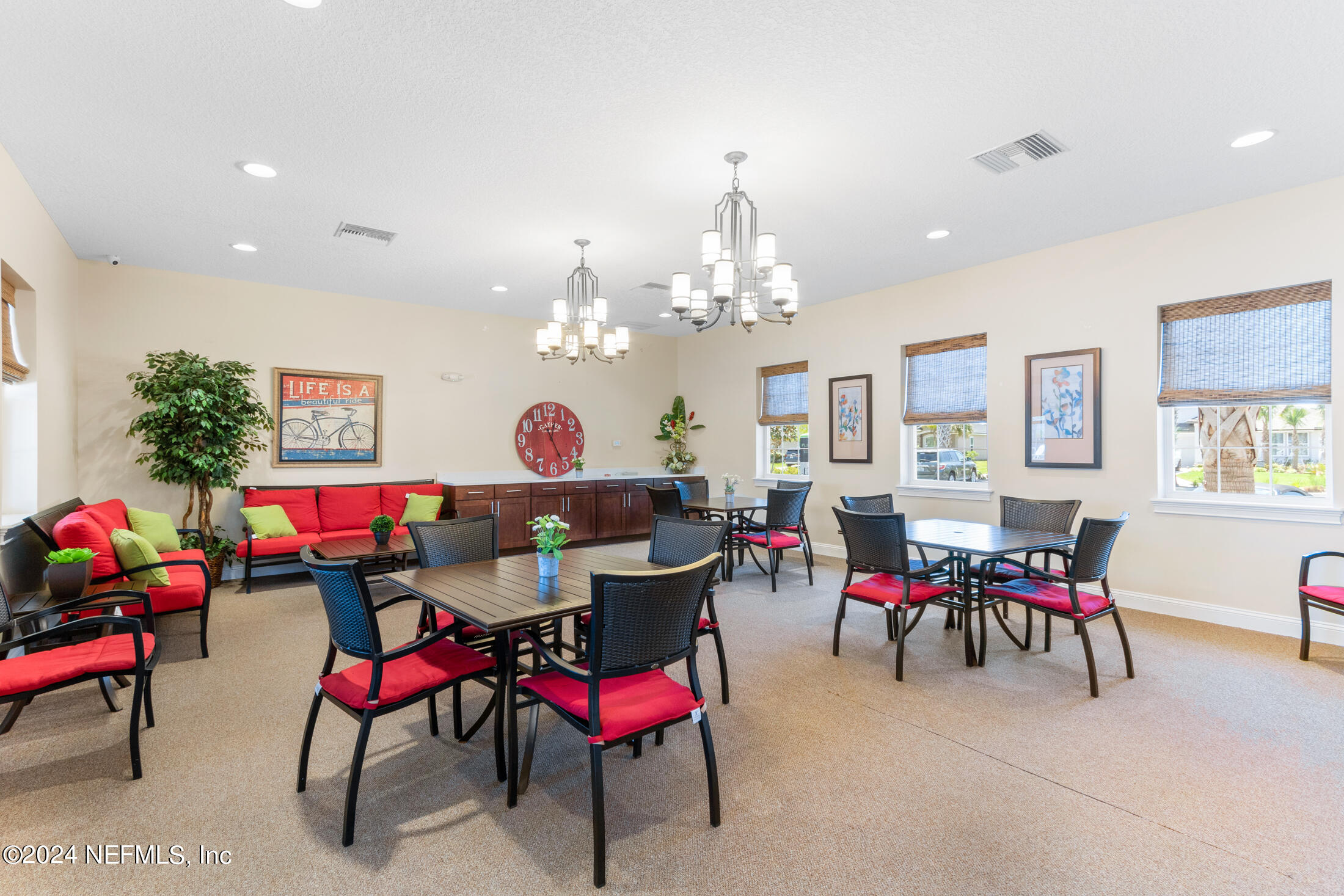277 Palace Drive St. Augustine, FL 32084 - Photo 29 of 36 a view of a dining room with furniture and a chandelier