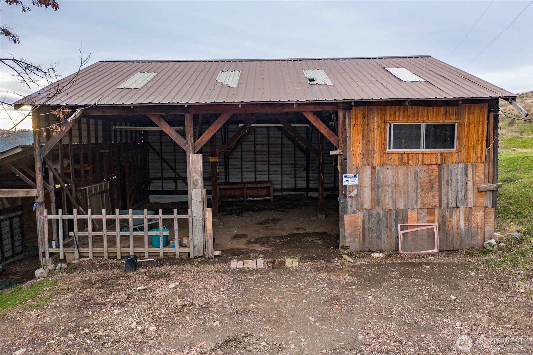 4521 Highway 25 South Hunters, WA 99137 - Photo 13 of 36 a view of a house with wooden fence