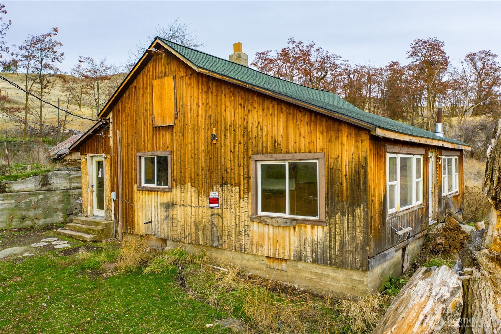 4521 Highway 25 South Hunters, WA 99137 - Photo 7 of 36 a view of a house with backyard and sitting area
