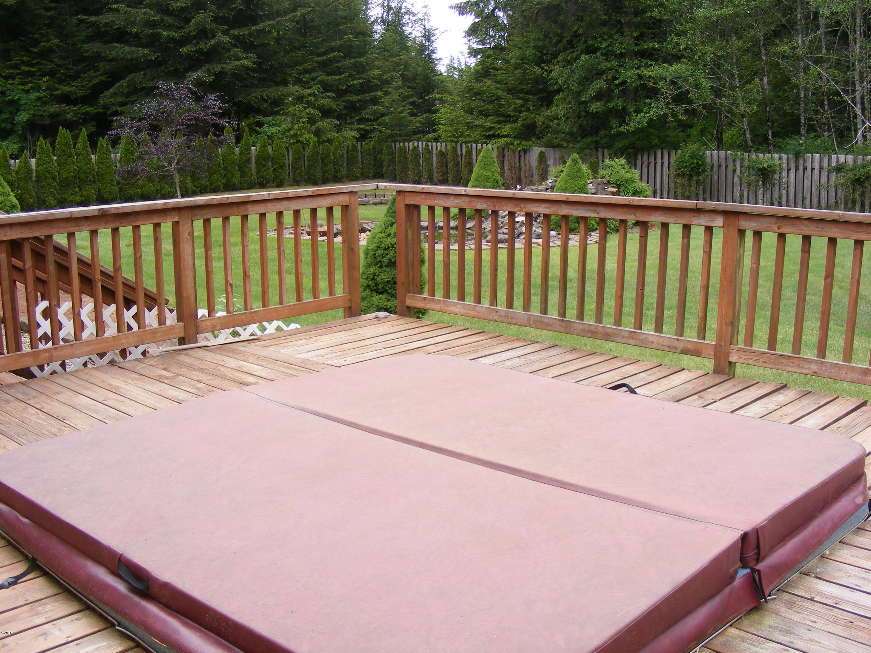 463 Judd Road Siletz, OR 97380 - Photo 15 of 22 Hot tub deck