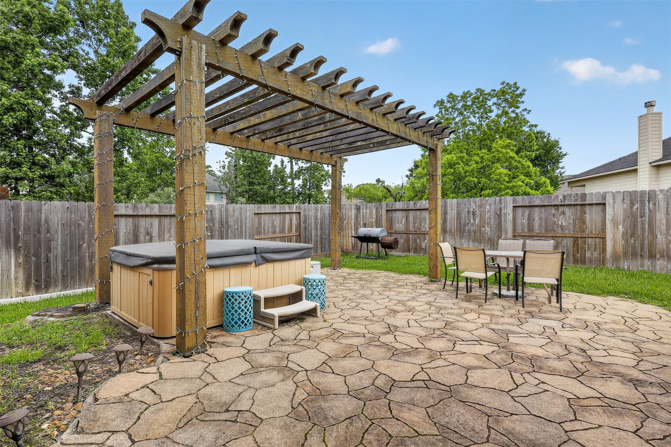 25710 Crisp Spring Lane Spring, TX 77373 - Photo 31 of 37 Backyard Pergola & Patio (View 1)
Inviting outdoor living space with a custom pergola, extended stamped concrete patio, and plenty of room for entertaining.