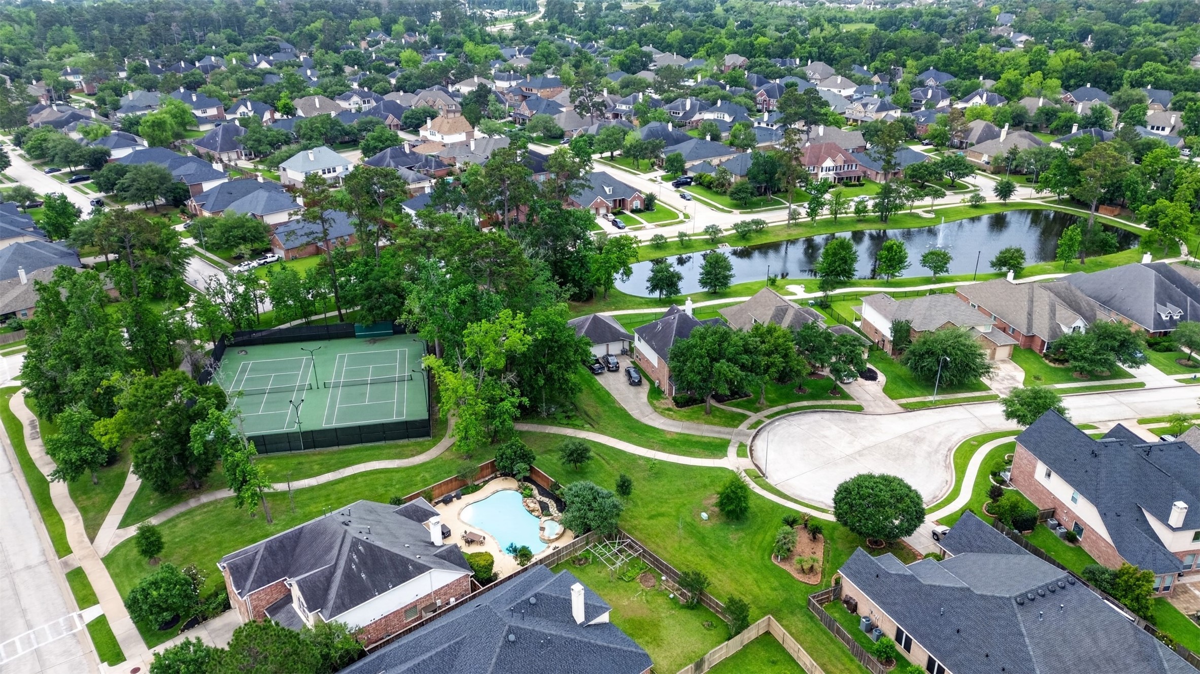 25710 Crisp Spring Lane Spring, TX 77373 - Photo 35 of 37 Neighborhood Aerial Overview
Sweeping aerial view of the community highlighting tree-lined streets, beautiful homes, and convenient layout.