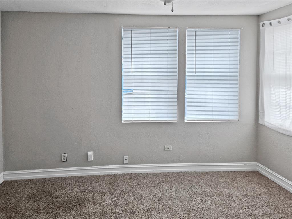 507 West Nash Street Terrell, TX 75160 - Photo 15 of 22 an empty room with a window