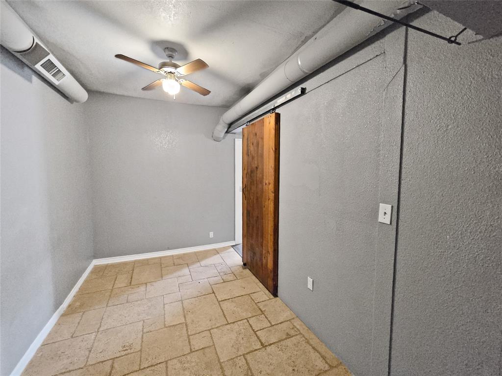507 West Nash Street Terrell, TX 75160 - Photo 22 of 22 a view of an empty room with a window
