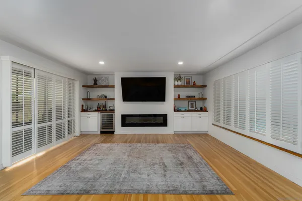 a view of a kitchen with furniture and a fireplace