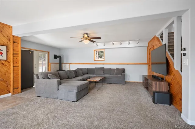 a living room with furniture and a couch
