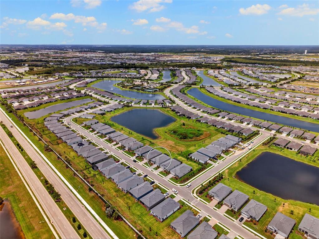 18237 Beach Ranch Terrace Bradenton, FL 34211 - Photo 60 of 72 a view of a balcony with city view